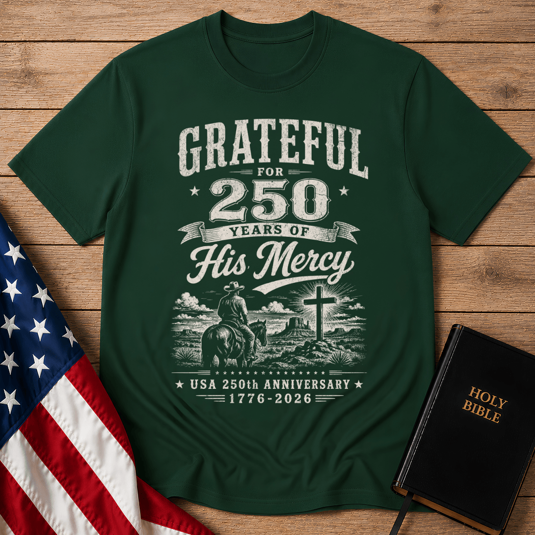 Christian t shirts featuring a cowboy on a horse looking at a cross for the USA 250th anniversary.