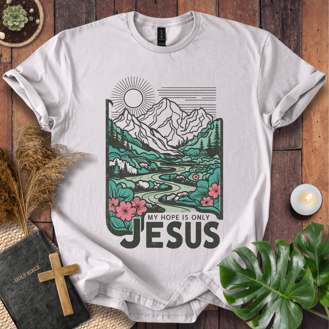 My Hope Is Only Jesus Christian t-shirt in white—mountain and river graphic with florals.