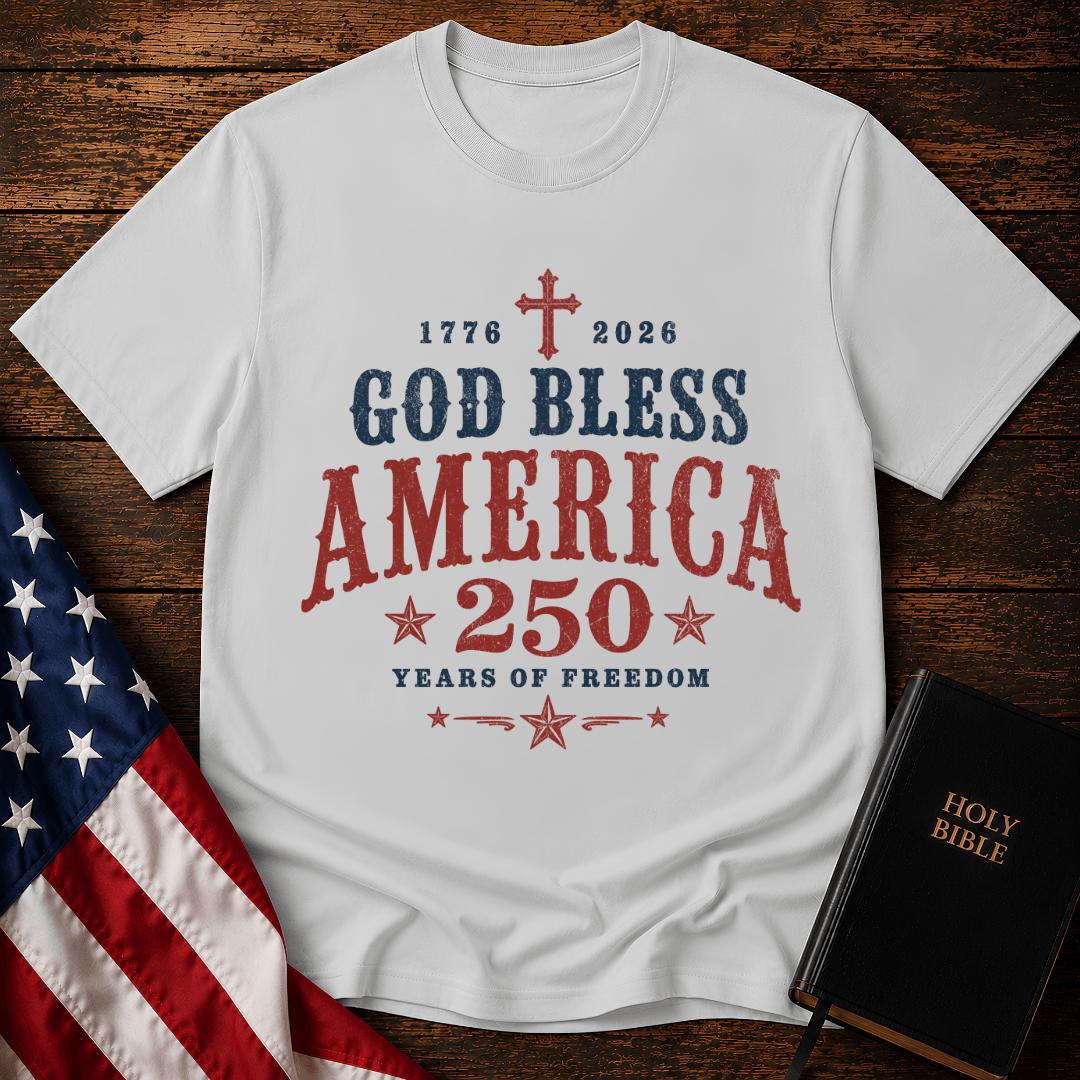 God Bless America 250 Years of Freedom t-shirt next to a Holy Bible and US flag