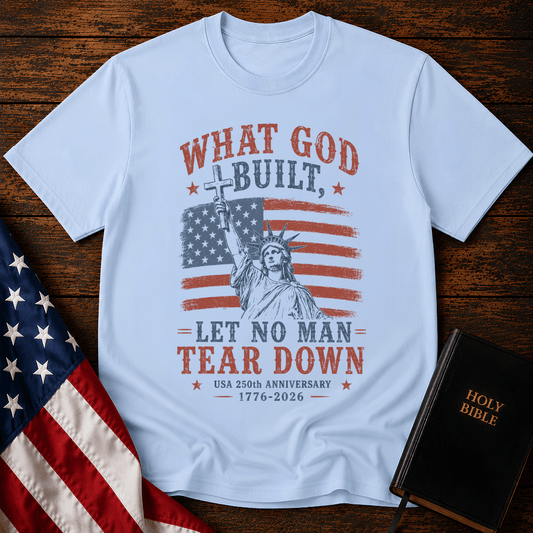 Patriotic Christian t shirt featuring the Statue of Liberty holding a cross over an American flag for the USA 250th anniversary.