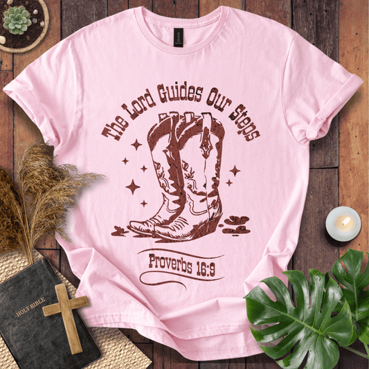 Proverbs 16:9 Christian t shirts for women featuring vintage cowboy boots and "The Lord Guides Our Steps"