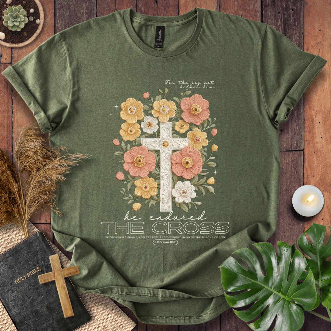Easter-shirt with a cross and peach flowers featuring Hebrews 12:2 scripture, an essential in women's Christian tees.