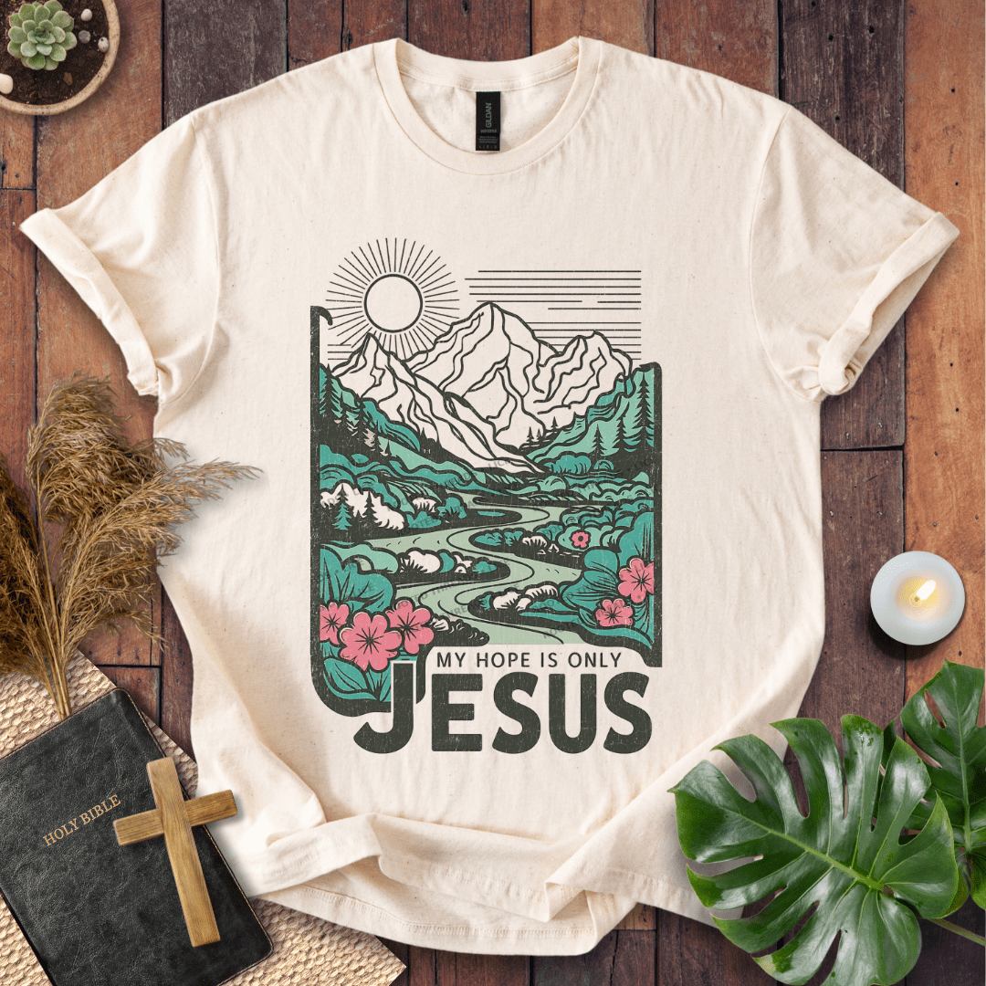 My Hope Is Only Jesus Christian t-shirt in white—mountain and river graphic with florals.