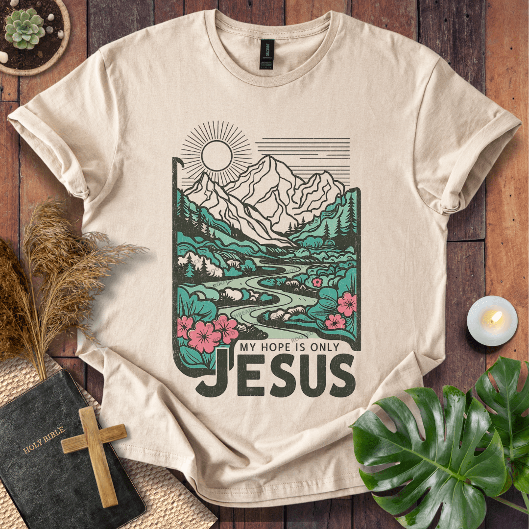 My Hope Is Only Jesus Christian t-shirt in white—mountain and river graphic with florals.