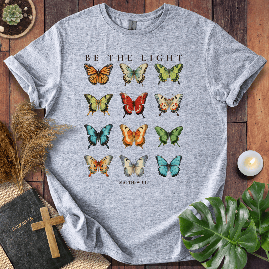t-shirt featuring 12 vintage-style butterflies with Matthew 5:14 scripture.