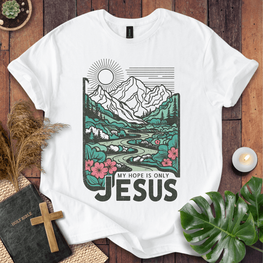 My Hope Is Only Jesus Christian t-shirt in white—mountain and river graphic with florals.