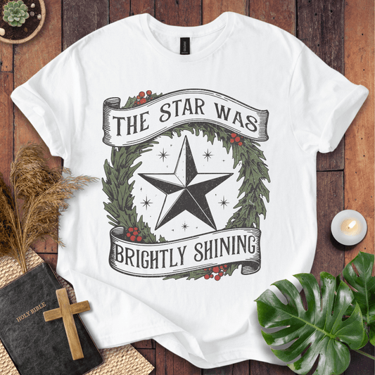 The Star Was Brightly Shining Christian Christmas t-shirt with wreath and star design