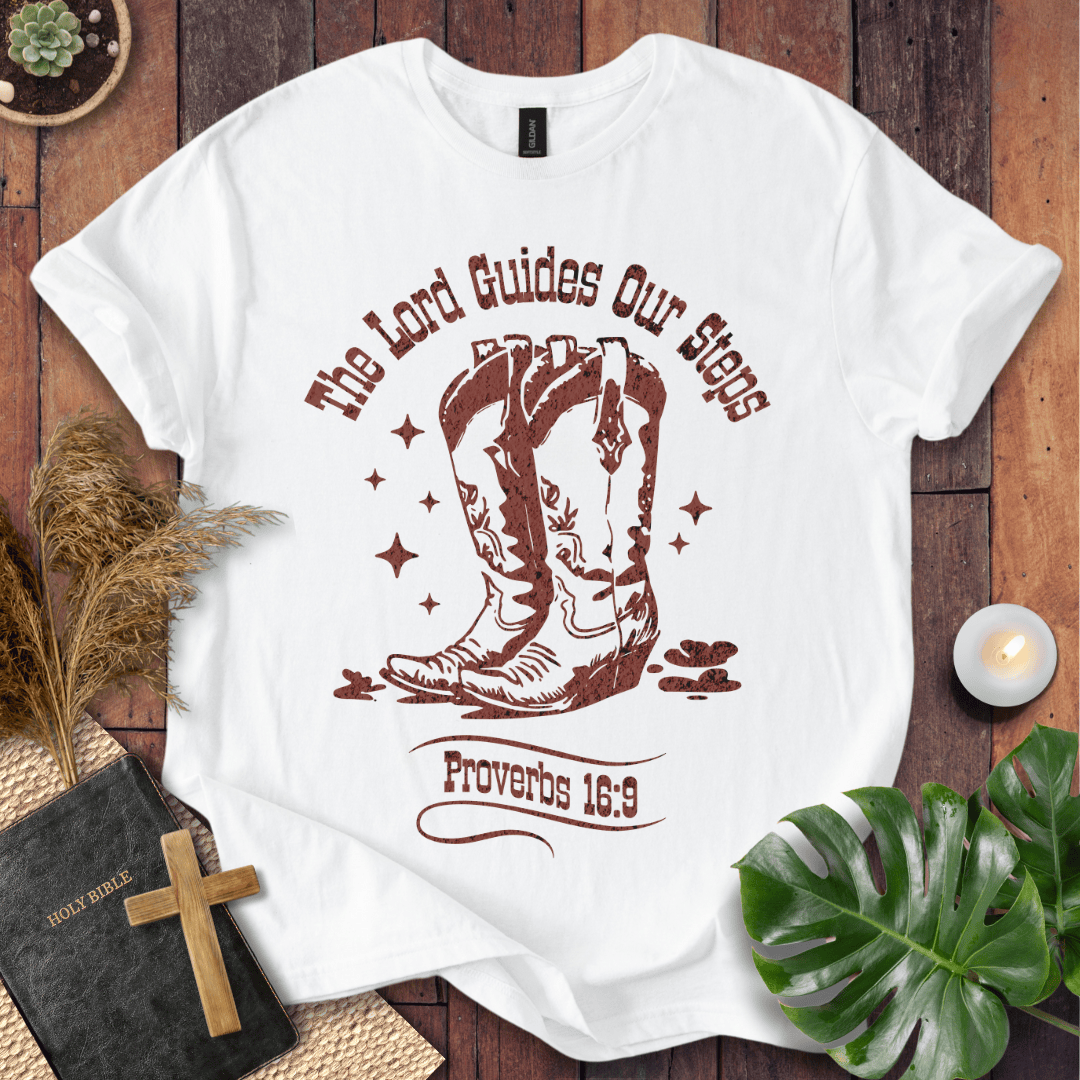 Proverbs 16:9 Christian t shirts for women featuring vintage cowboy boots and "The Lord Guides Our Steps"