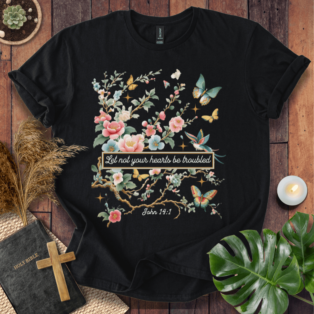 Christian t shirt for women featuring John 14:1 with pink flowers, butterflies, and a hummingbird in a botanical style.