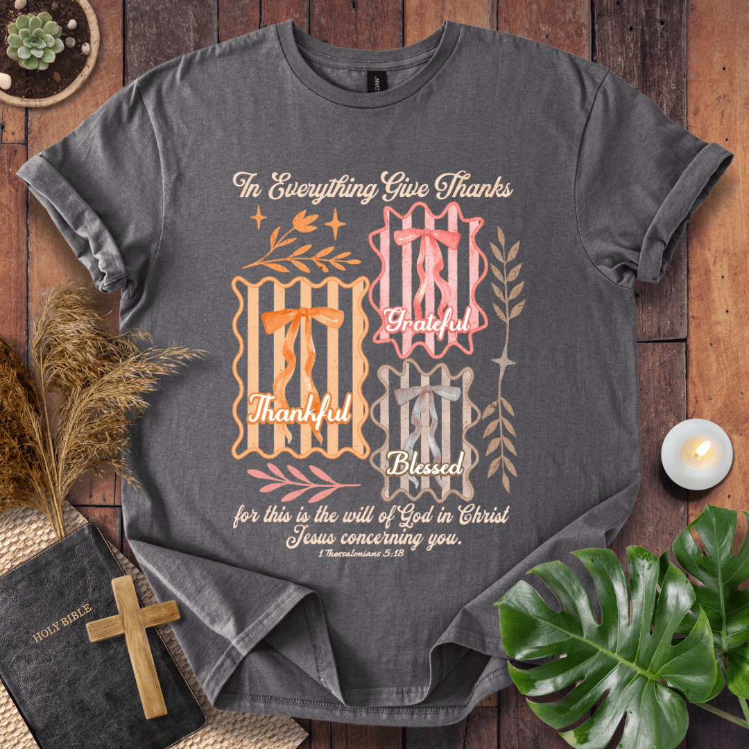 Christian t-shirt with "In Everything Give Thanks" 1 Thessalonians 5:18 verse, pink bows, and botanical vintage graphics.