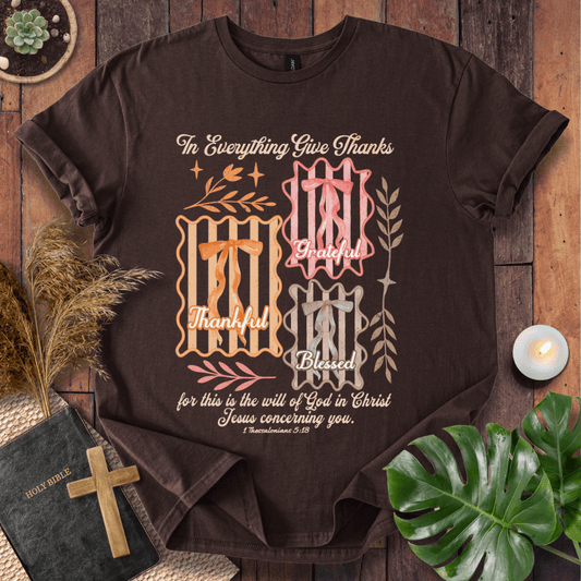 Christian t-shirt with "In Everything Give Thanks" 1 Thessalonians 5:18 verse, pink bows, and botanical vintage graphics.