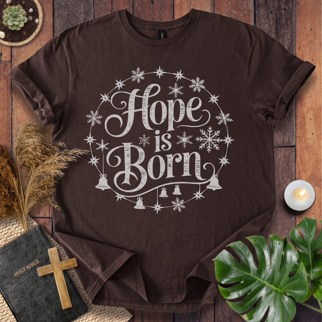 Hope Is Born Christian Christmas t-shirt with festive snowflake design