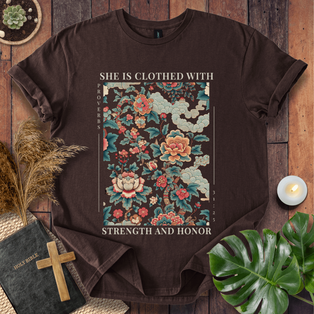 “She is Clothed with Strength and Honor” Proverbs 31:25 Christian t-shirt with floral tapestry design; Bible verse shirt for women.