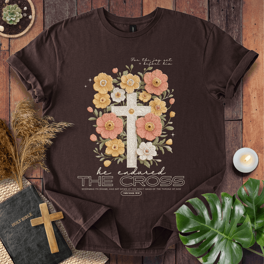 Easter-shirt with a cross and peach flowers featuring Hebrews 12:2 scripture, an essential in women's Christian tees.