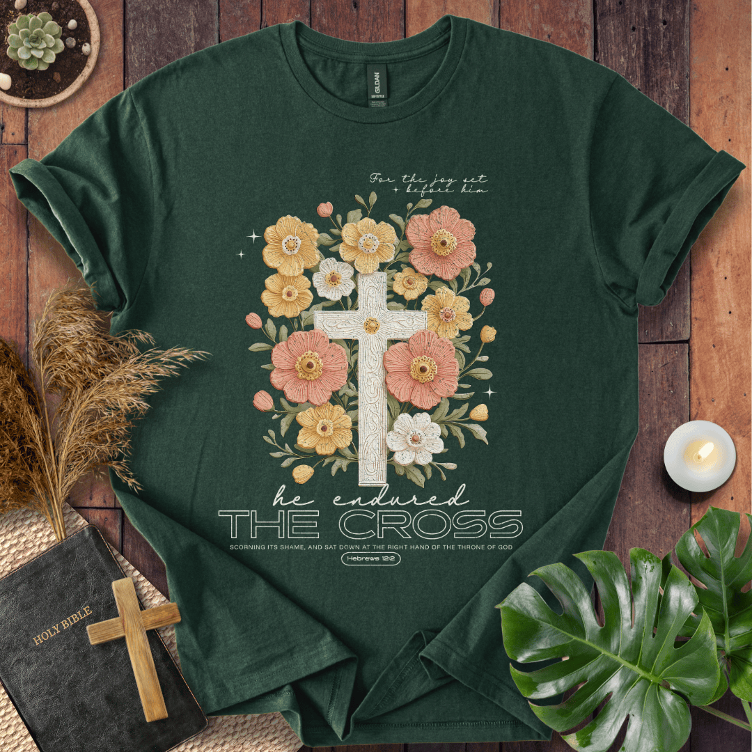 Easter-shirt with a cross and peach flowers featuring Hebrews 12:2 scripture, an essential in women's Christian tees.