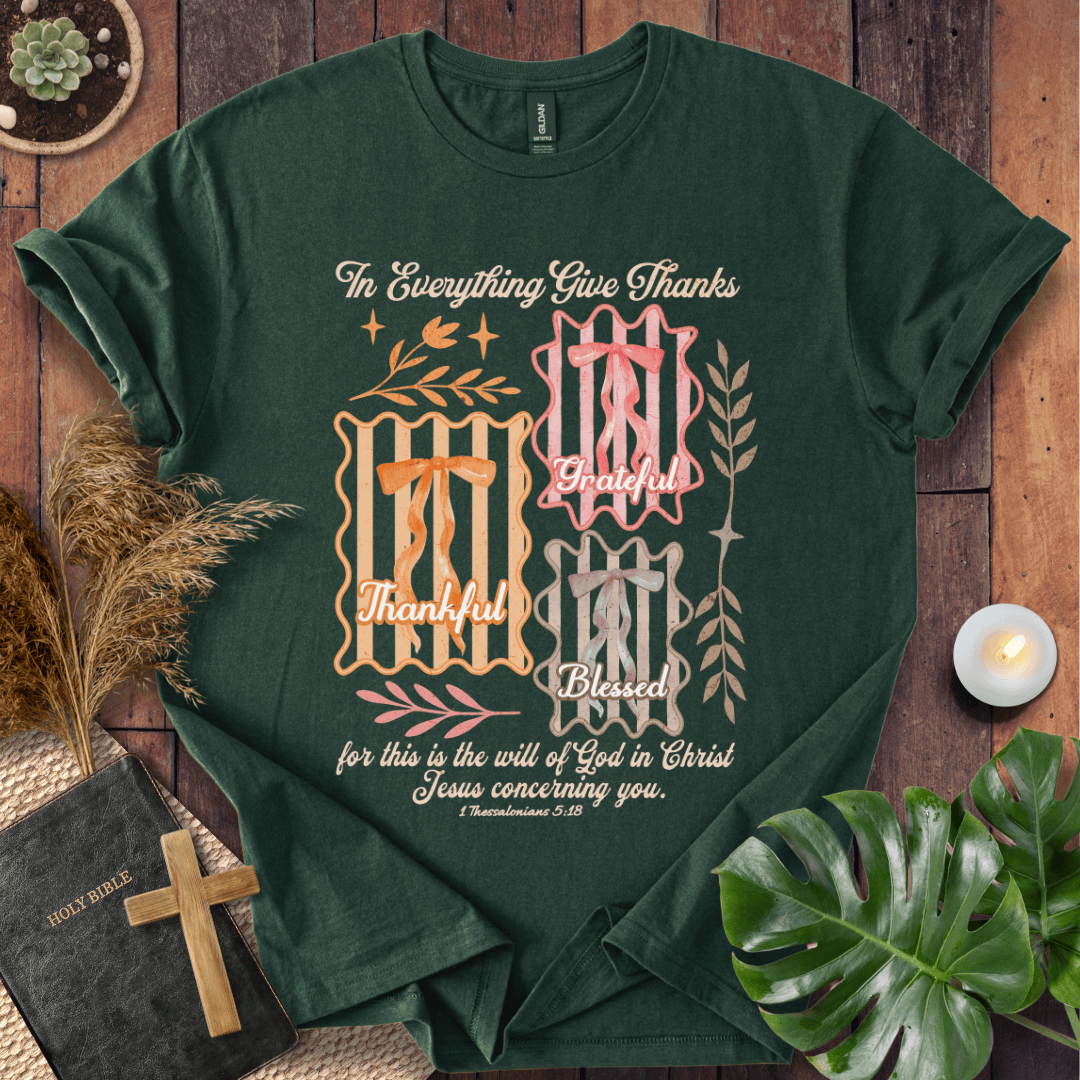Christian t-shirt with "In Everything Give Thanks" 1 Thessalonians 5:18 verse, pink bows, and botanical vintage graphics.