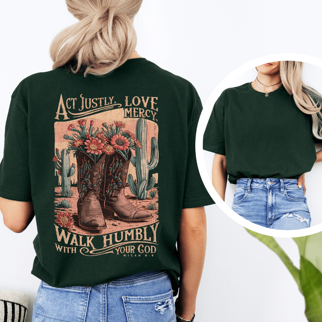 Rear view of a woman wearing Micah 6:8 t-shirt from Black.jpg, featuring western cowboy boots, cacti, and desert wildflowers.