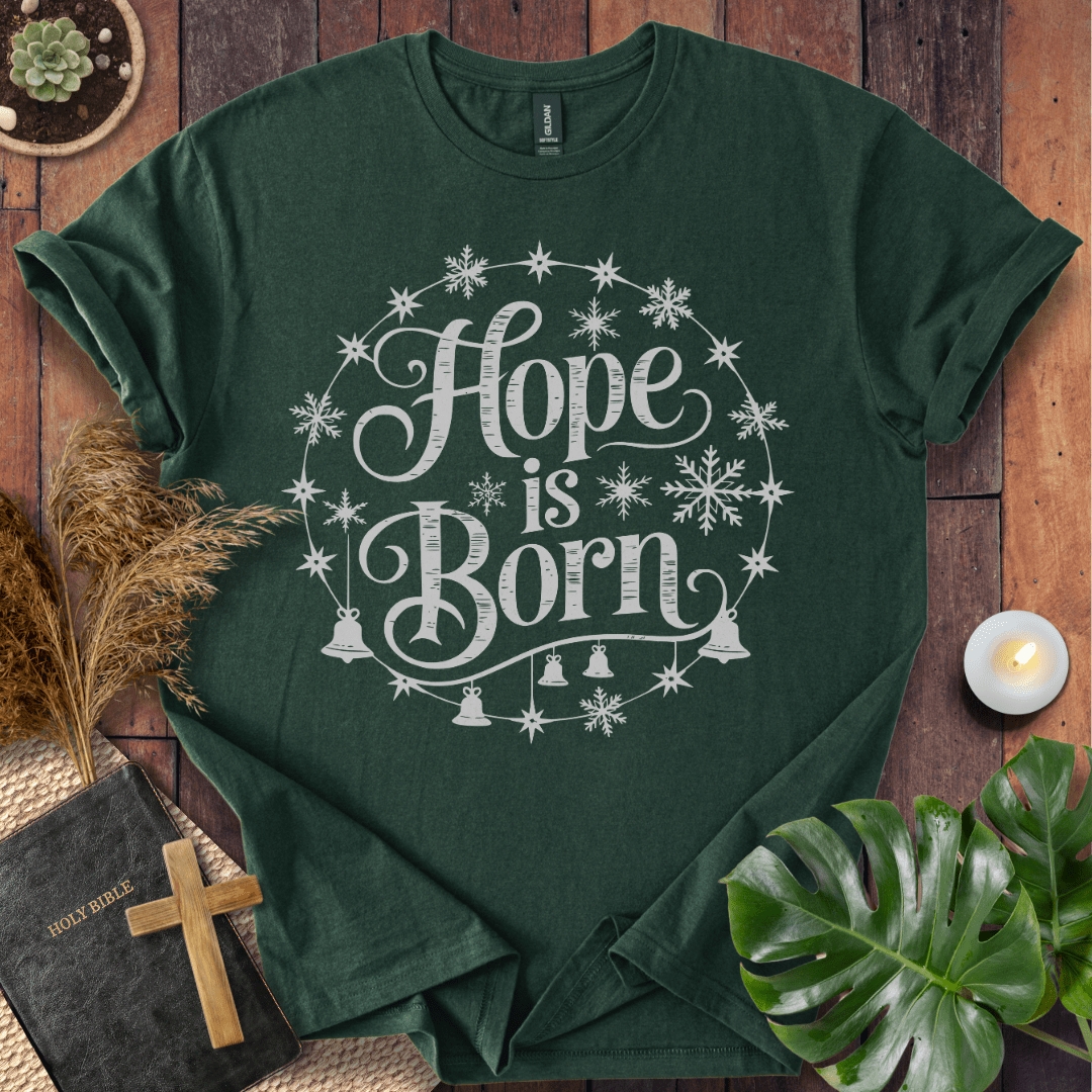Hope Is Born Christian Christmas t-shirt with festive snowflake design