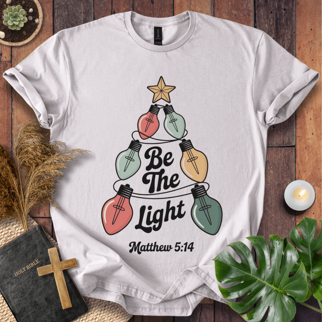 Faith Christmas shirt encouraging believers to shine their light – religious holiday tee