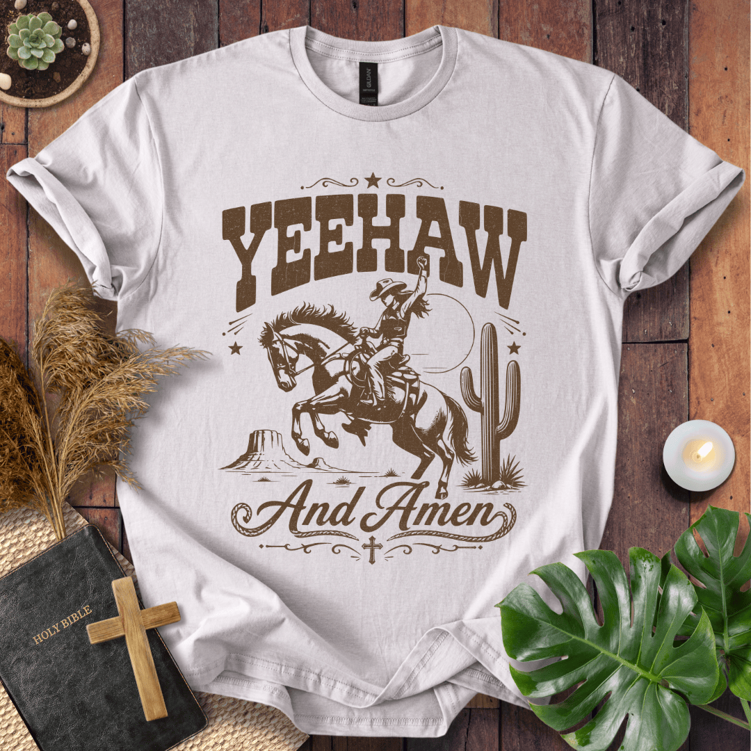 Yeehaw and Amen Christian t shirt for women featuring a vintage brown graphic of a cowgirl riding a bucking horse.
