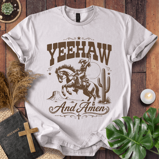 Yeehaw and Amen Christian t shirt for women featuring a vintage brown graphic of a cowgirl riding a bucking horse.