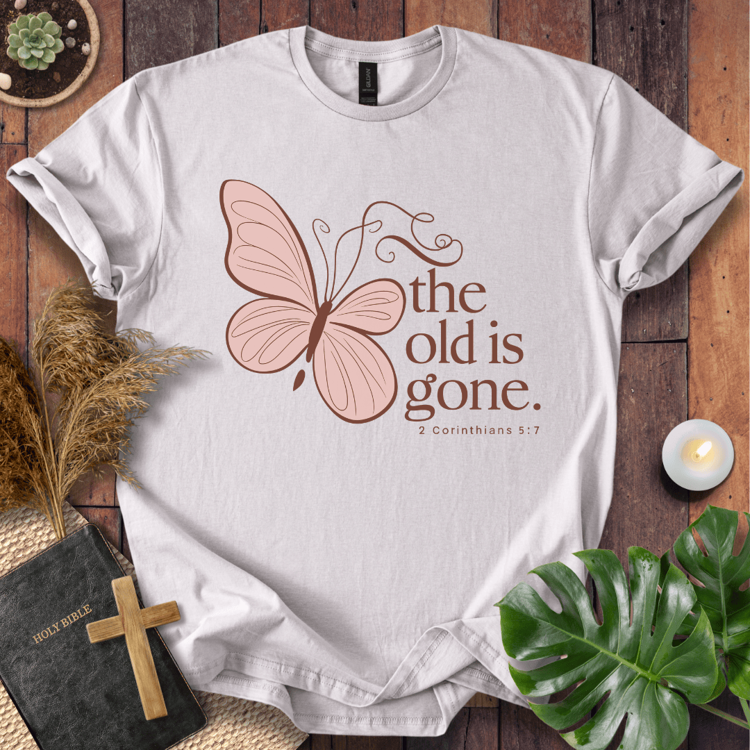 t-shirt with a dusty rose butterfly and "the old is gone" 2 Corinthians 5:17 text in brown ink.