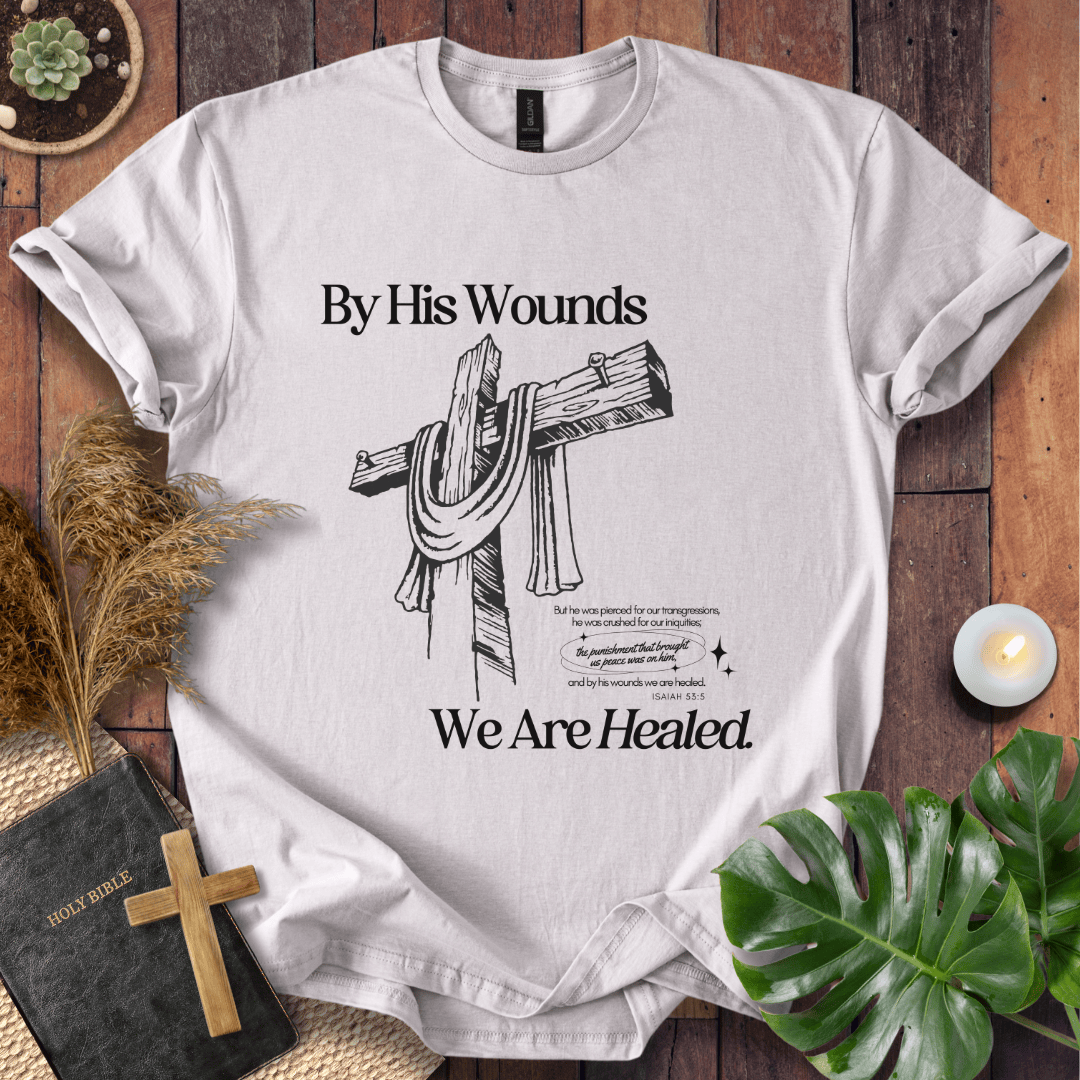 Easter Christian t-shirt featuring a rustic wooden cross with Isaiah 53:5 text, "By His Wounds We Are Healed.