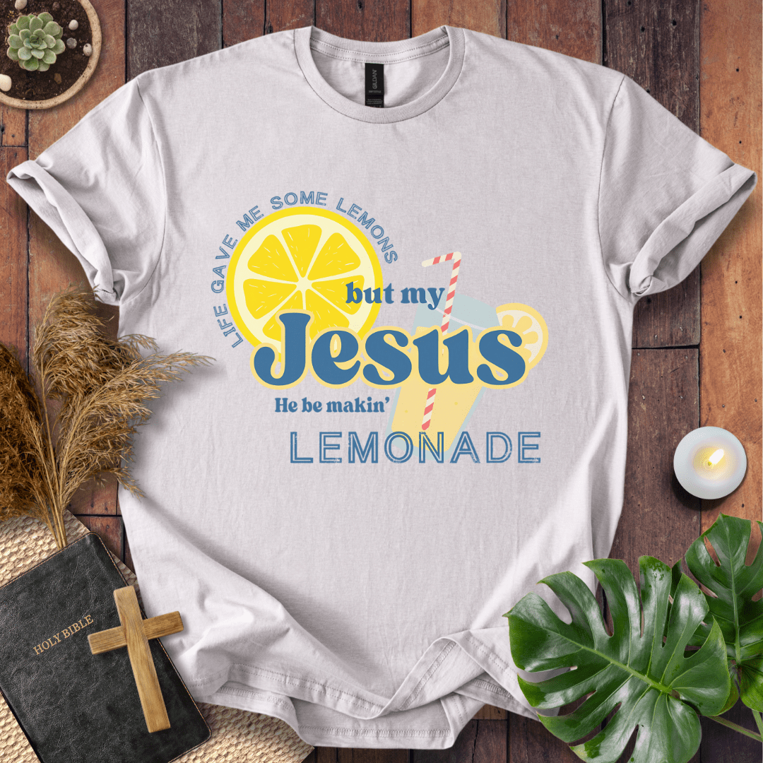 “Life gave me lemons but my Jesus makes lemonade” Christian t-shirt with bold lemon and straw graphic; playful faith tee.