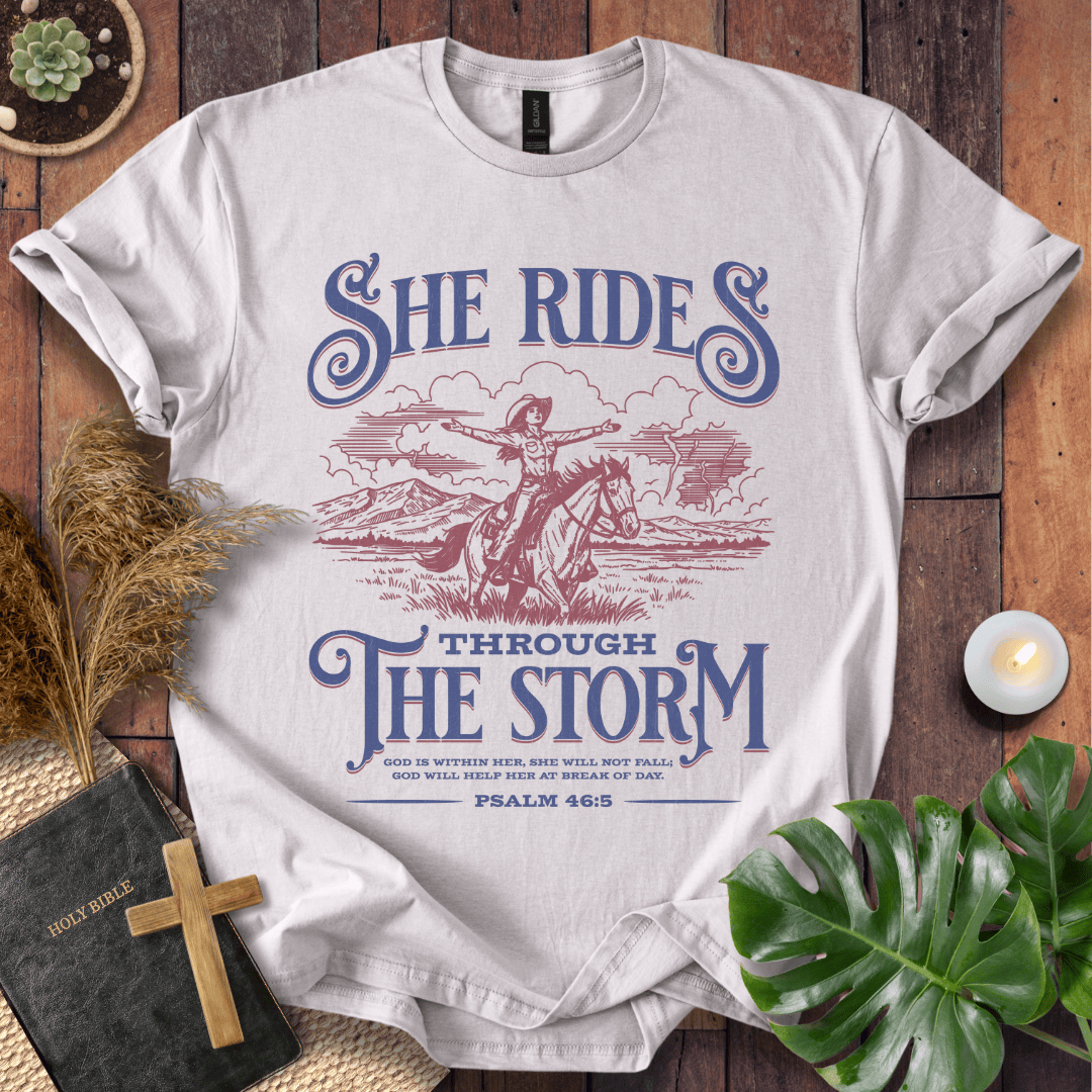 Cowgirl Christian shirt – She Rides Through the Storm tee by Rooted Threads
