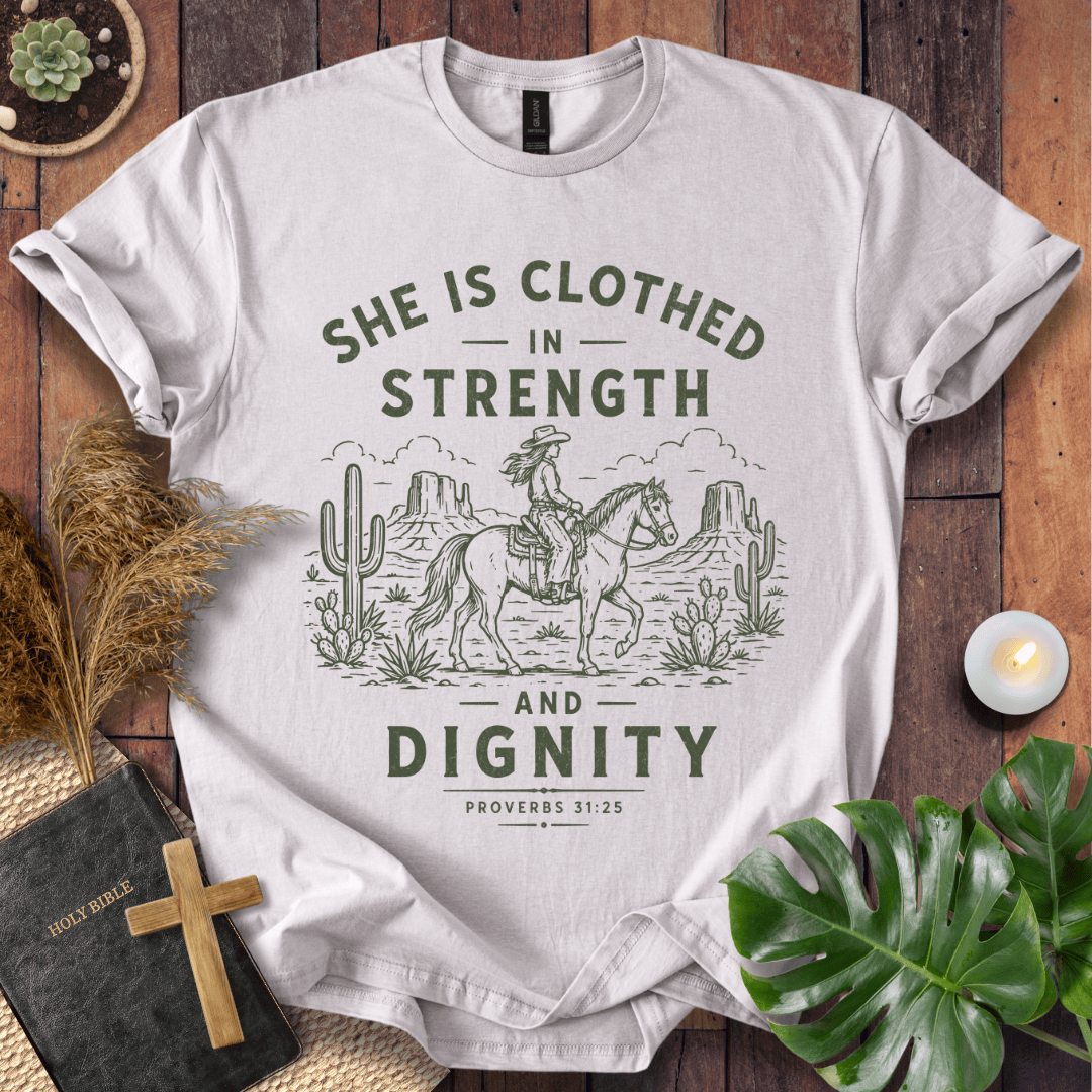 Proverbs 31 bible verse tees featuring a vintage sage green design of a cowgirl riding a horse in a desert landscape.