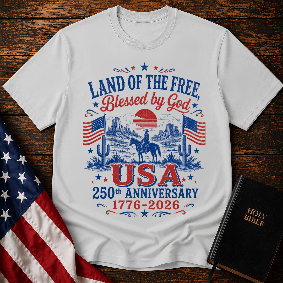 Vintage USA 250th anniversary Christian t shirt featuring a cowboy on a horse in a desert landscape with American flags.