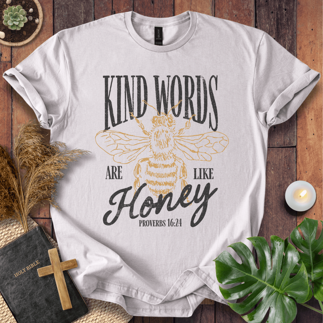 Proverbs 16:24 "Kind Words Are Like Honey" t-shirt featuring a vintage gold honeybee graphic and rustic text.