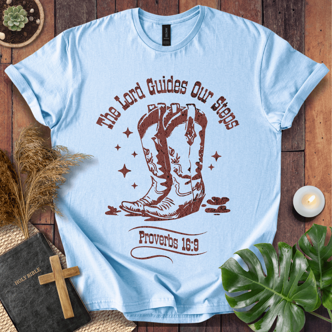 Proverbs 16:9 Christian t shirts for women featuring vintage cowboy boots and "The Lord Guides Our Steps"