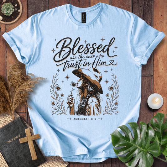 Jeremiah 17:7 sand t-shirt featuring a western woman in a cowboy hat holding a flower with stars and branches.
