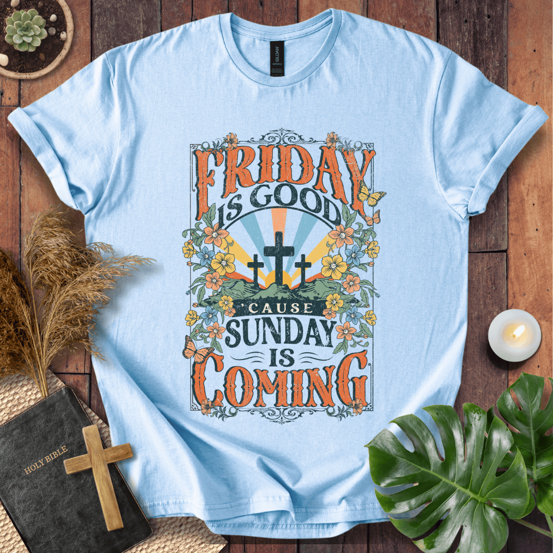 Christian Easter t-shirt featuring "Friday is Good Cause Sunday is Coming" vintage design with three crosses and wildflowers.