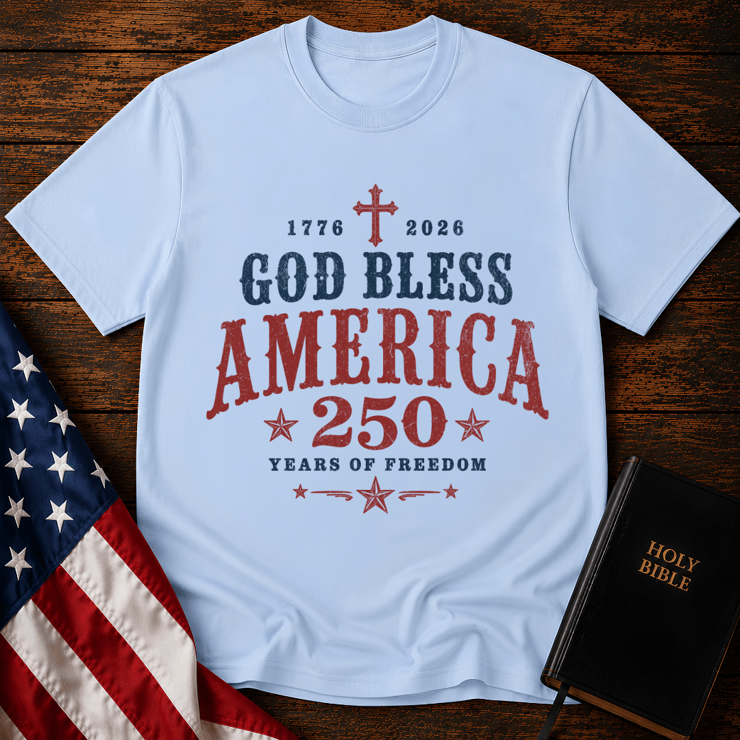 God Bless America 250 Years of Freedom t-shirt next to a Holy Bible and US flag