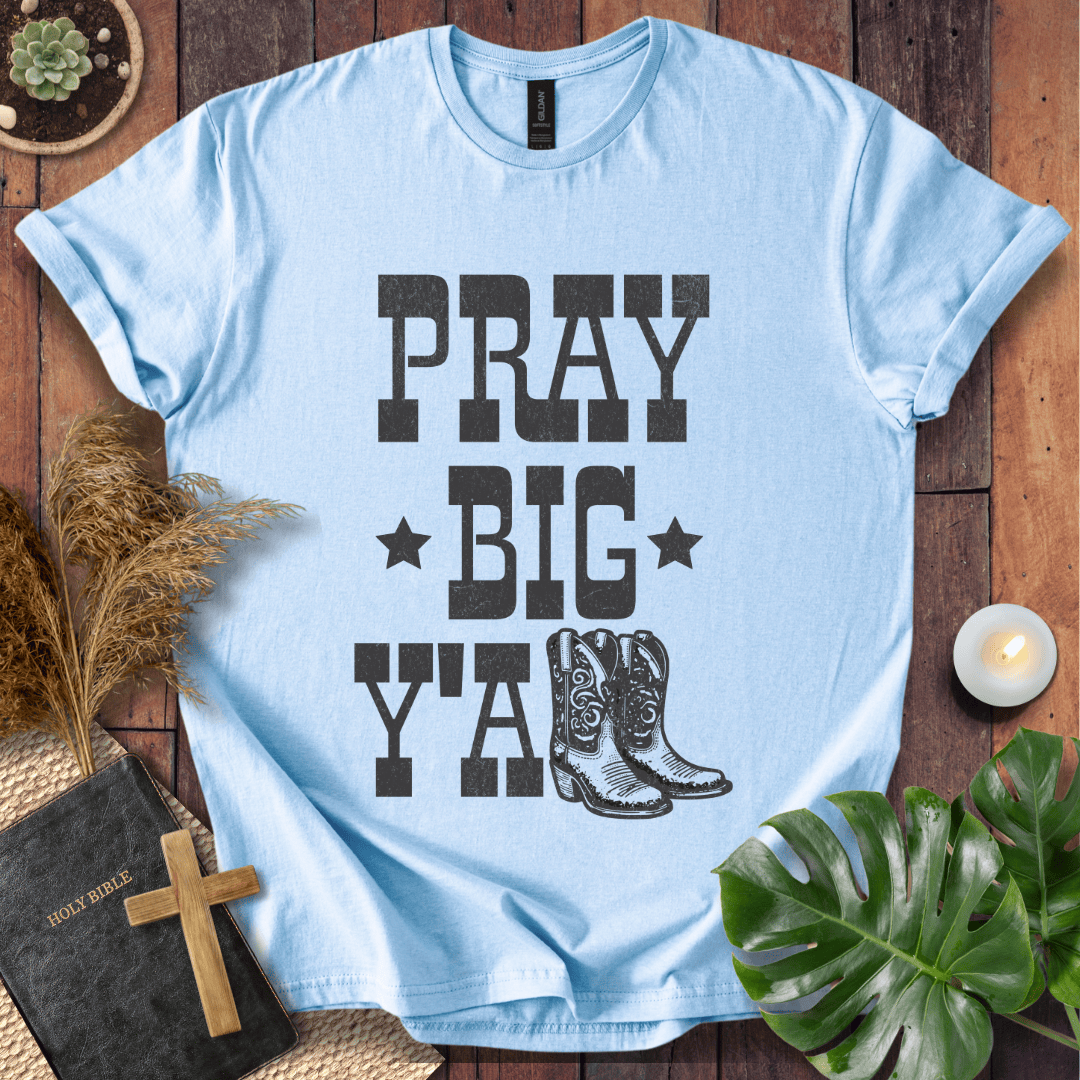 A women's Christian tee shirts featuring boots and "Pray Big Y'all," perfect for bible quote shirts fans.