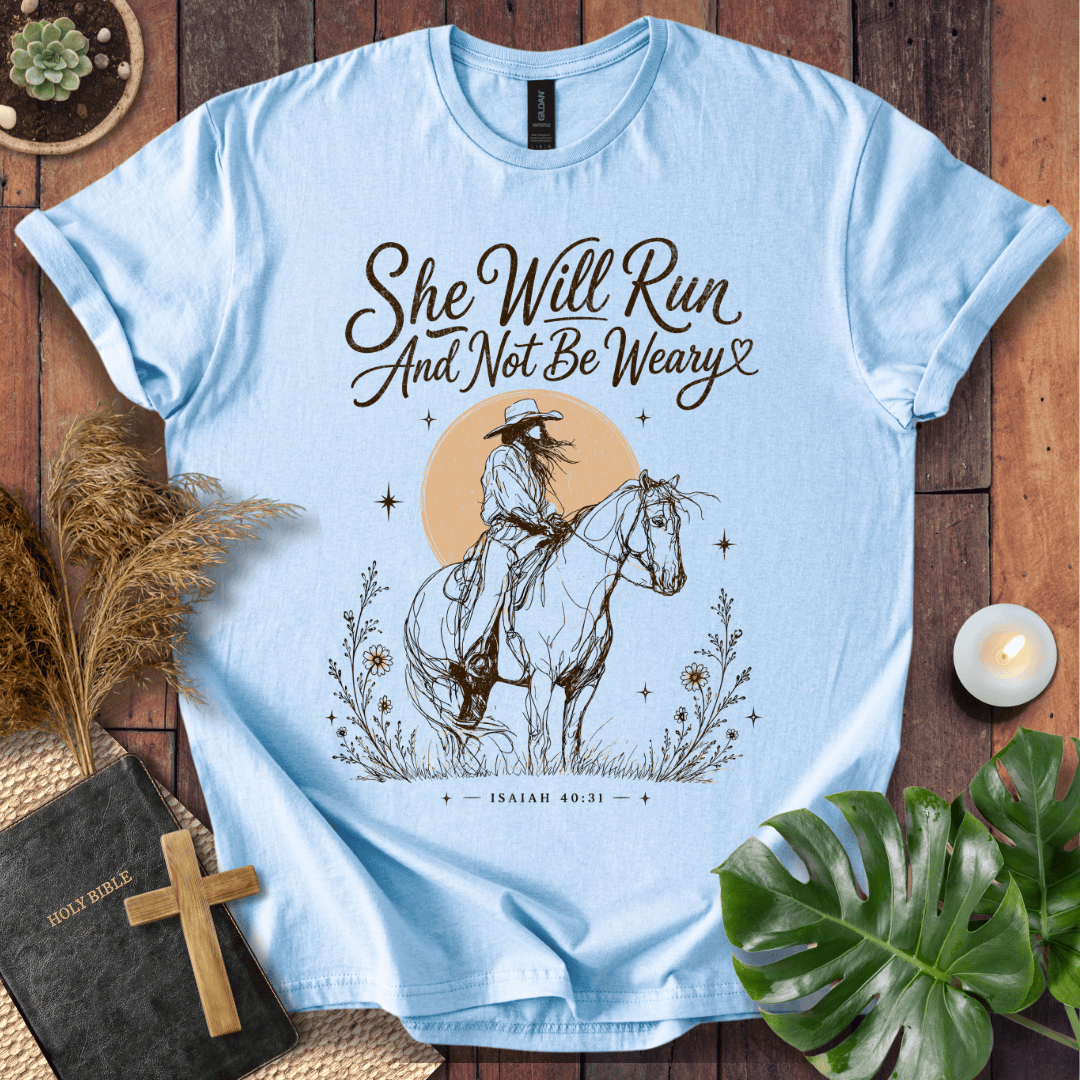 A vintage cream t-shirt featuring a sketched cowgirl on a horse under a desert sun with Isaiah 40:31.