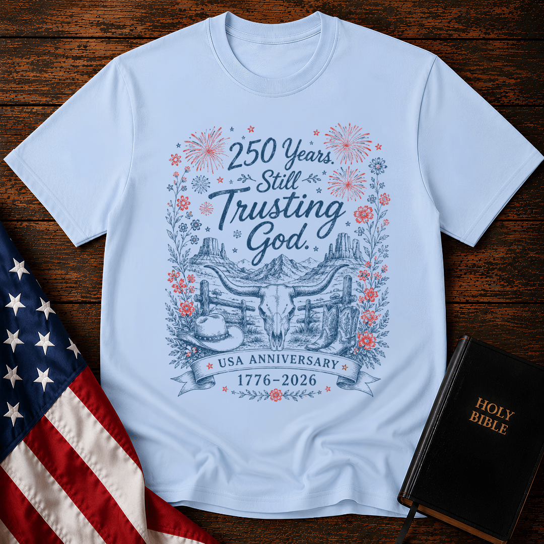 patriotic western graphic tee featuring a longhorn skull, cowboy boots, fireworks, and 1776-2026 text.