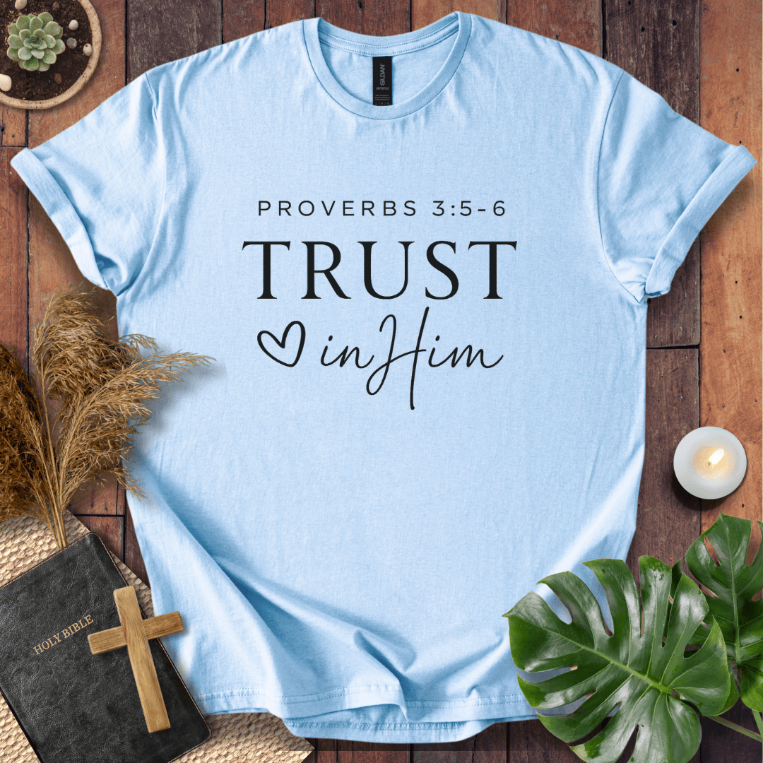 Minimalist Proverbs 3:5-6 Trust in Him shirt for women, a boho style bible verse t shirt on a wooden background.
