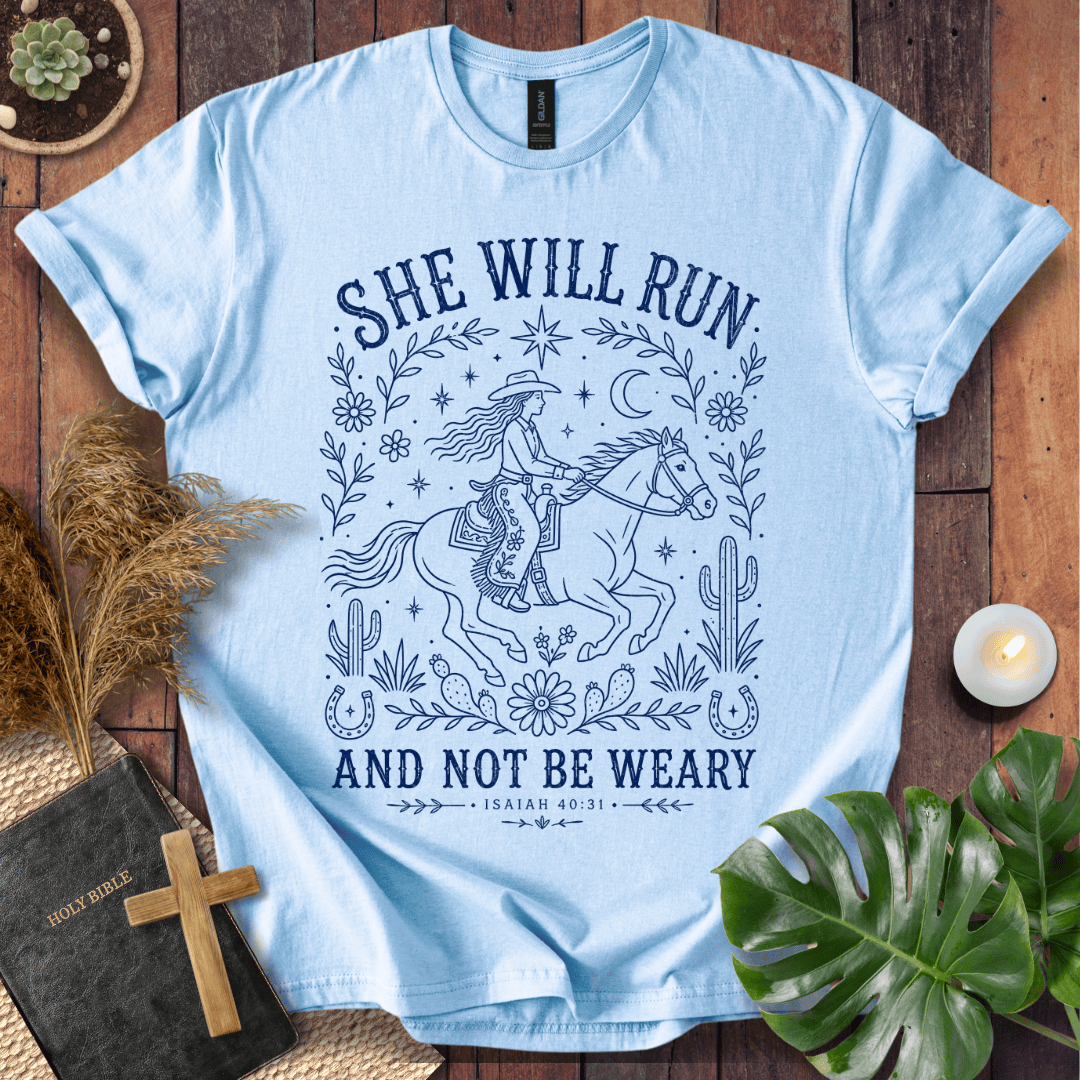Isaiah 40:31 She Will Run scripture quote on a shirt featuring a navy line art cowgirl riding a horse.