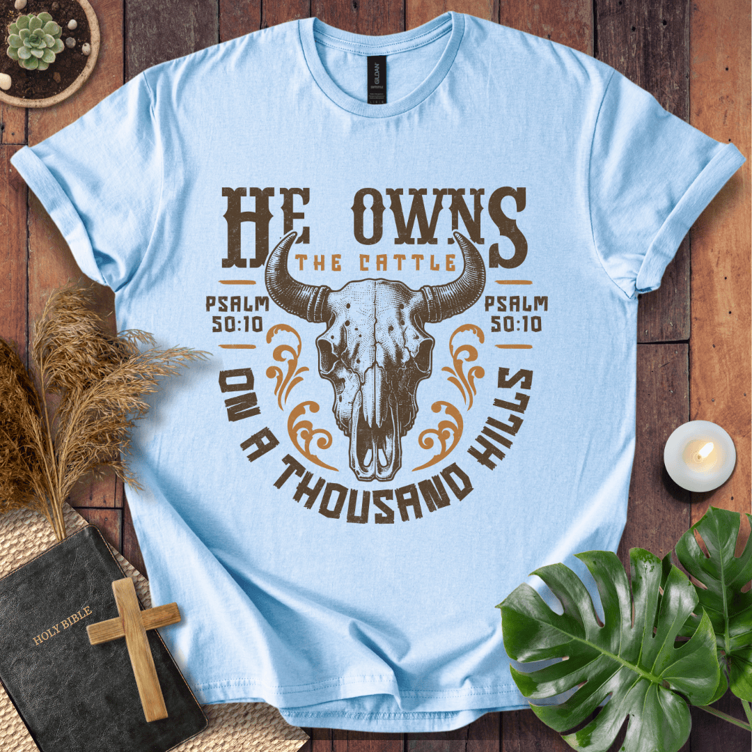 Christian t shirt for women featuring a longhorn skull and Psalm 50:10 He owns the cattle on a thousand hills.