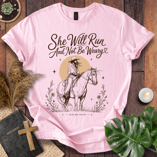 A vintage cream t-shirt featuring a sketched cowgirl on a horse under a desert sun with Isaiah 40:31.