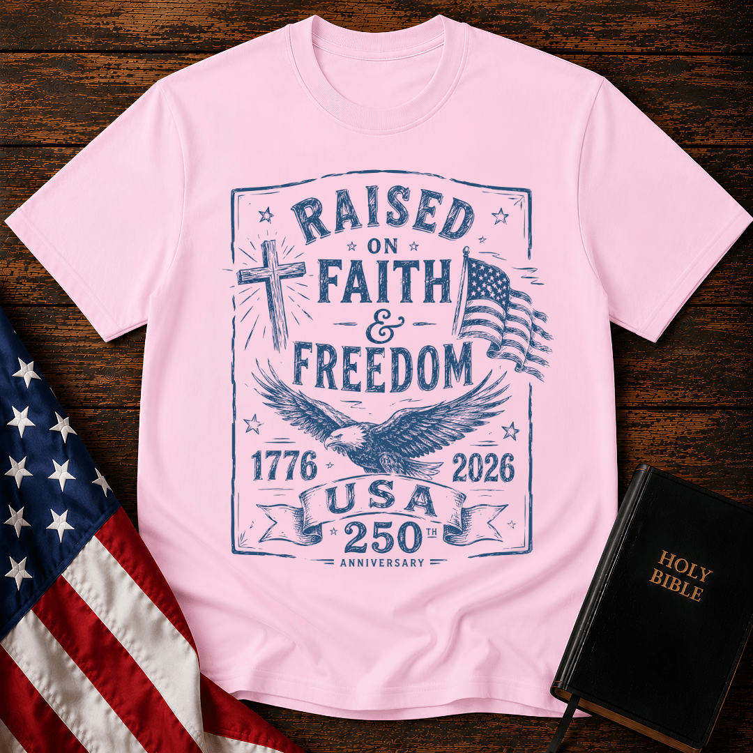 Patriotic Christian t shirts for women with a blue sketch of a cross, eagle, American flag, and 1776-2026.