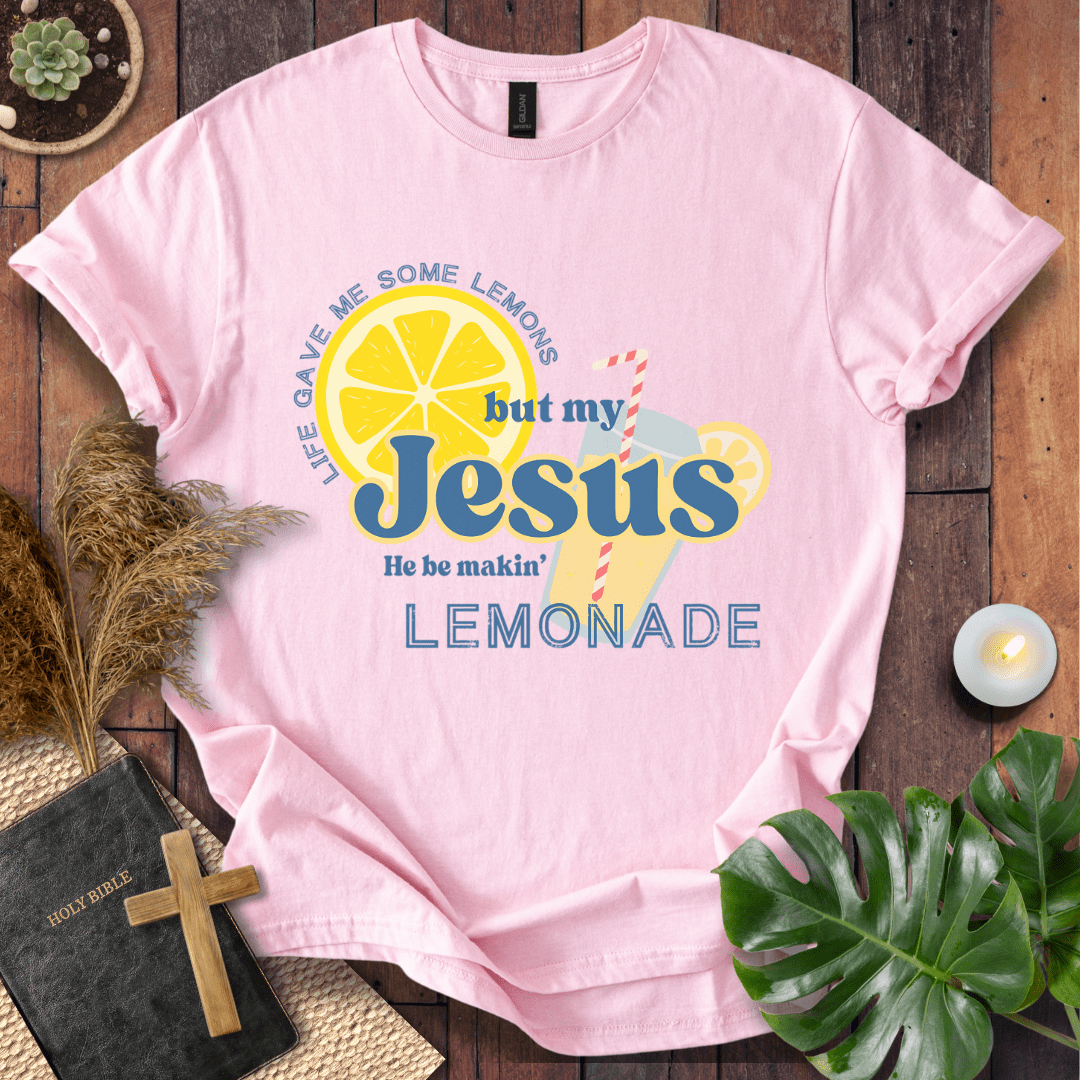 “Life gave me lemons but my Jesus makes lemonade” Christian t-shirt with bold lemon and straw graphic; playful faith tee.