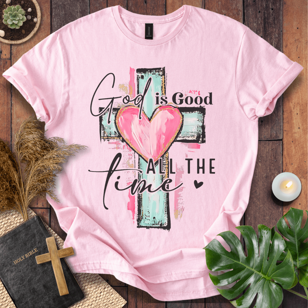 God is Good All the Time Christian t-shirt—brushstroke cross with heart and hand-lettered script.