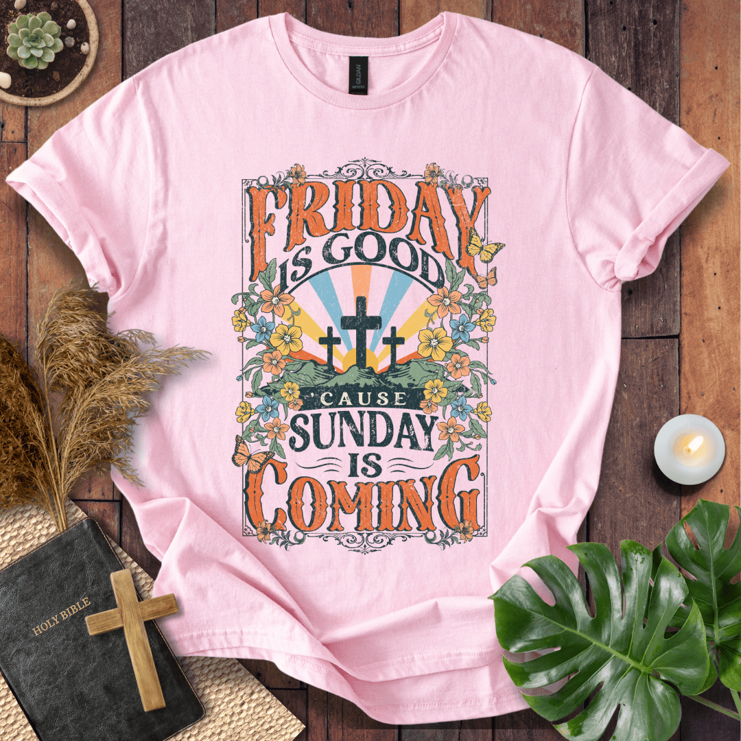 Christian Easter t-shirt featuring "Friday is Good Cause Sunday is Coming" vintage design with three crosses and wildflowers.
