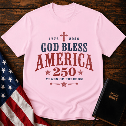 God Bless America 250 Years of Freedom t-shirt next to a Holy Bible and US flag