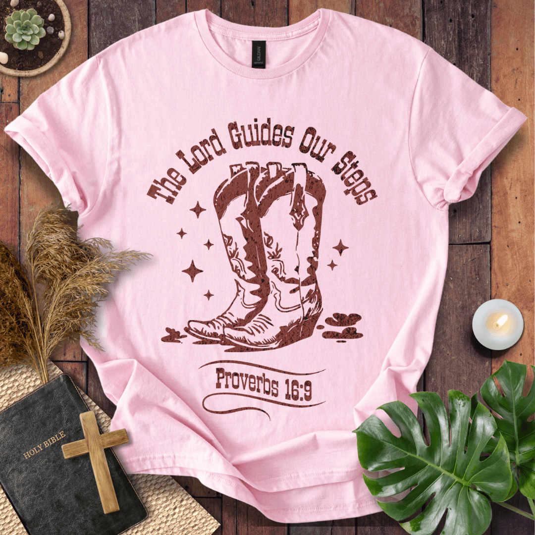 Proverbs 16:9 Christian t shirts for women featuring vintage cowboy boots and "The Lord Guides Our Steps"