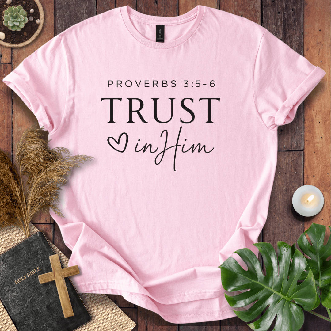 Minimalist Proverbs 3:5-6 Trust in Him shirt for women, a boho style bible verse t shirt on a wooden background.